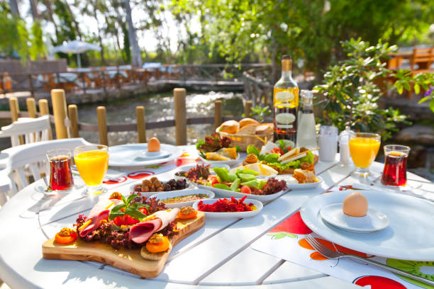Traditional Turkish Breakfast by the River in Marmaris, Turkey stock photo