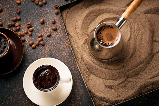 Traditional Turkish Coffee Prepared On Hot Sand Stock Photo - Download Image Now - iStock