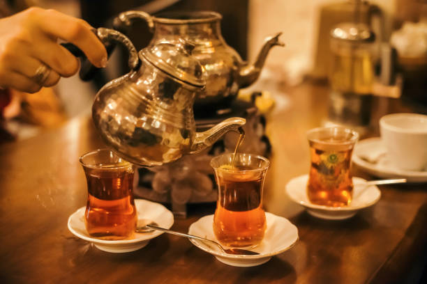 Traditional turkish tea ceremony in cafe stock photo