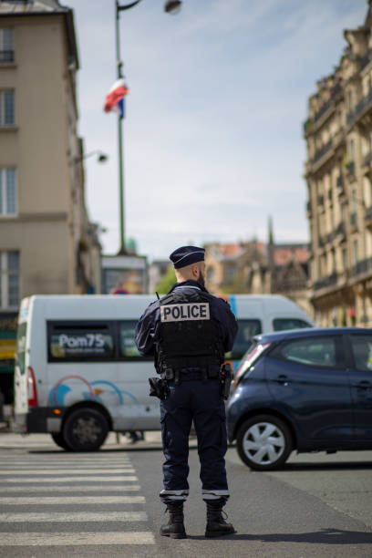 Traffic Cop in the streets of Paris stock photo