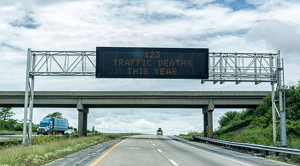 Traffic Deaths Statistics Expressway Overhead Road Sign stock photo