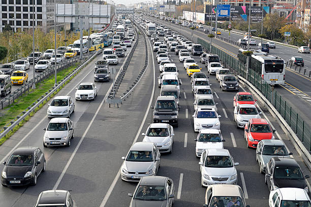 Traffic jam on rush hour Istanbul Istanbul, Turkey - November 24, 2013: Cars driving on Zincirlikuyu District in istanbul. Heavy traffic moves slowly on a Zincirlikuyu district in İstanbul are usually crowded. traffic stock pictures, royalty-free photos & images