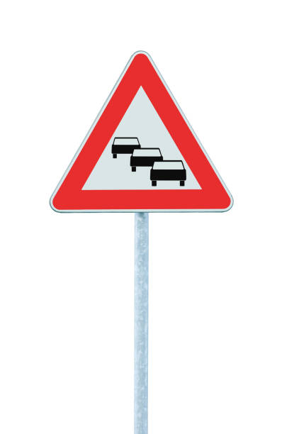 Traffic jam queues likely road sign, expect delays ahead warning isolated, traffic congestion symbol, red triangle, large detailed vertical closeup stock photo