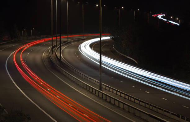 Traffic on Motorway at Night stock photo