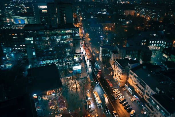 traffic on nezalezhnosti avenue near the hotel kharkiv at night time: aerial drone view - kharkiv imagens e fotografias de stock