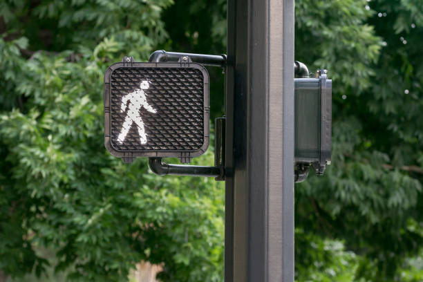 Traffic signal Signal letting the pedestrian know it's okay to walk crosswalk stock pictures, royalty-free photos & images