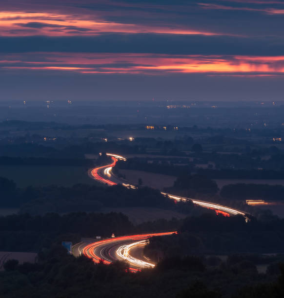 Traffic trails on the M40 as seen from Aston Rowant National Nature Reserve stock photo