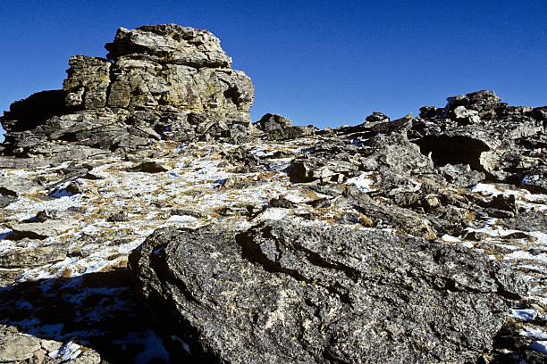 Rock Formations on the Continental Divide Trail Ridge Road crosses the Continental Divide of the Rocky Mountains.  The summit of the famous road, at 12,183 feet above sea level, is the highest road in Colorado.  These rock formations are at the summit.  Trail Ridge Road is in Rocky Mountain National Park, Colorado, USA. jeff goulden rocky mountain national park stock pictures, royalty-free photos & images