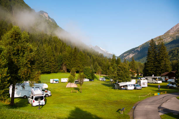Trailers camping under the Grossglockner mountain in Hohe Tauern national park Grossglockner, Austria - hohe tauern range stock pictures, royalty-free photos & images