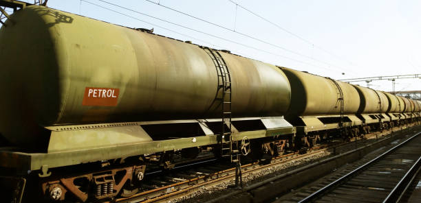 Train with tankers carrying crude oil Petrol Indian railways Train with tankers carrying crude oil - Petrol in India oil stock pictures, royalty-free photos & images