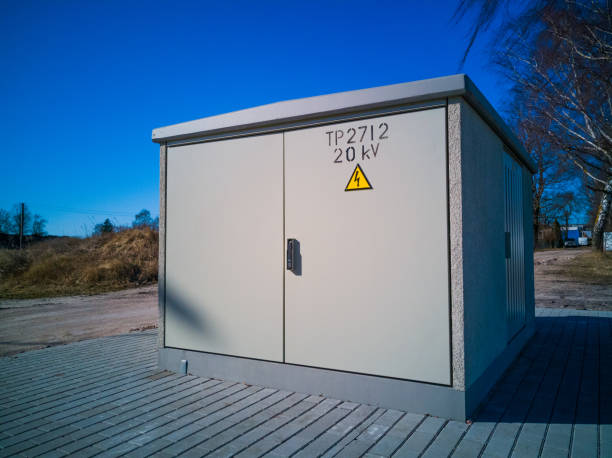 Transformer box in a sunny day Nice and clean transformer box in a sunny day, with a lot of free space on the door, 20KV electricity transformer stock pictures, royalty-free photos & images