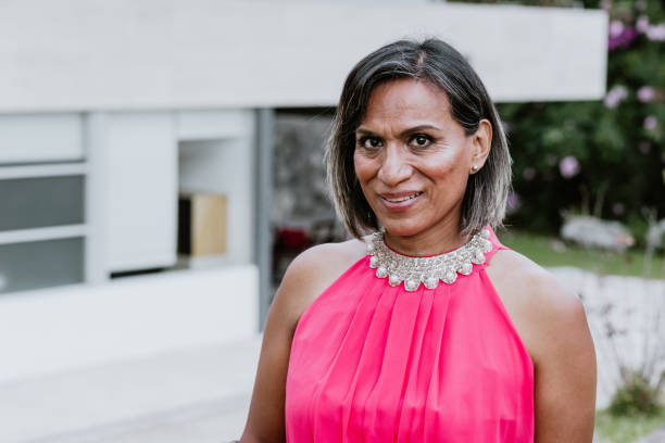 transgender latin woman portrait at the office terrace in Mexico Latin America stock photo