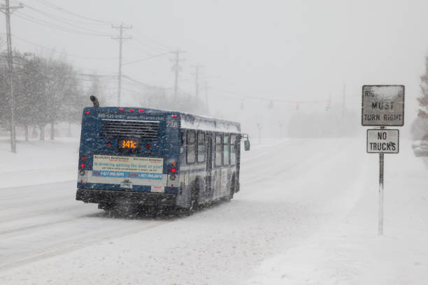 CT Transit transportation bus  during snow storm  day on Connecticut Ave. stock photo