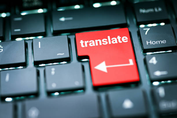 translate on laptop keyboard - tolk stockfoto's en -beelden