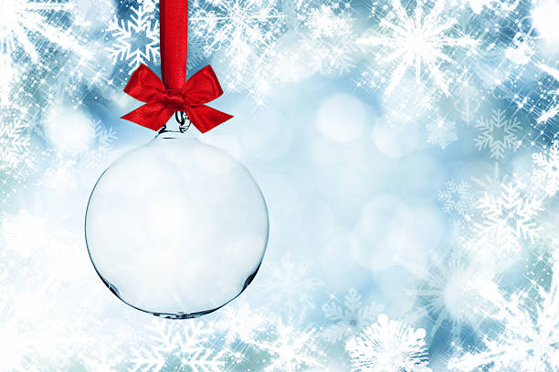 Transparent Christmas Ball Infront Of Snowflake Frame stock photo