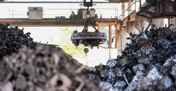 Transporting Scrap Steel By Crane, Recycling Of Material stock photo