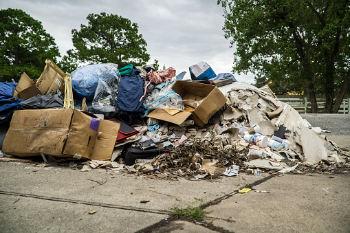 Trash and debris outside of a Houston neighborhood devastated by Hurricane Harvey