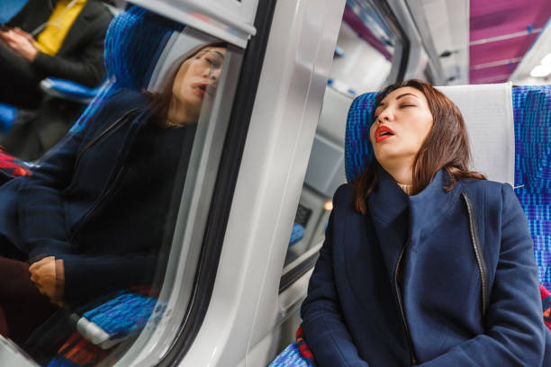 resenär kvinna rolig sova i ett tåg - public transport bildbanksfoton och bilder