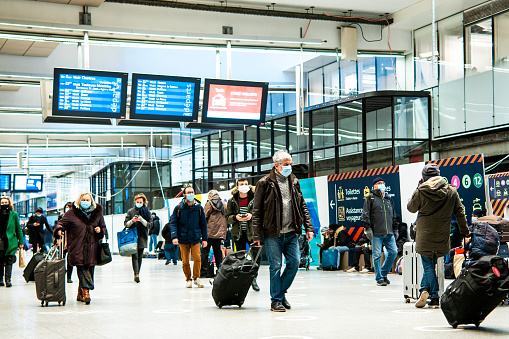 Gare Montparnasse with people wearing a mask, during pandemic Covid 19 – Paris, gare Montparnasse, in France. January 27, 2021