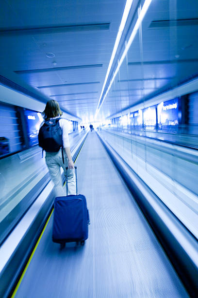 Traveling Woman Rushing to Flight stock photo