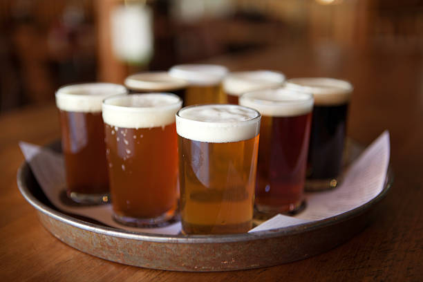 Tray filled with eight beer samplers stock photo