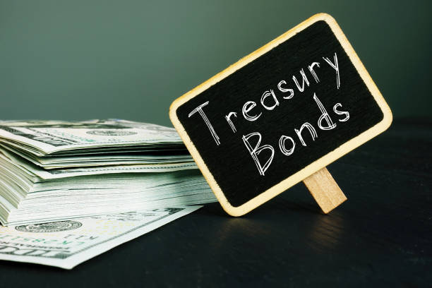 Treasury bonds is shown on the conceptual business photo Treasury bonds is shown on a conceptual business photo bonding stock pictures, royalty-free photos & images