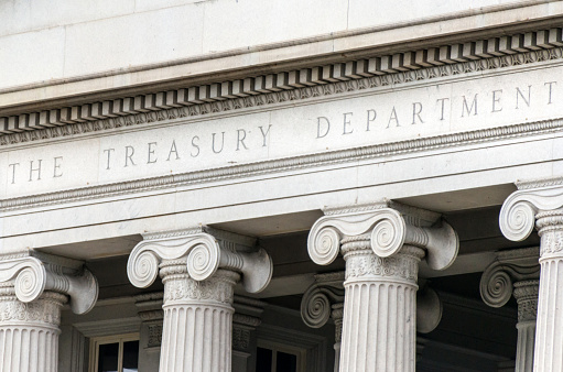 US treasury department sign in Washington dc building facade