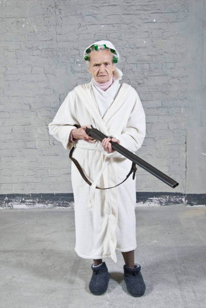 Old Woman Gun Stock Photos, Pictures & Royalty-Free Images ...