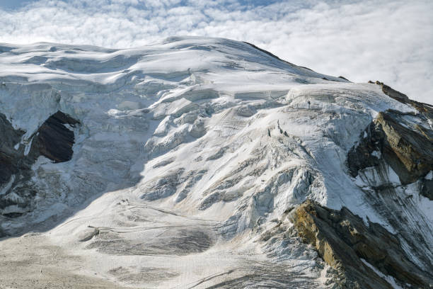 trift glacier as seen from hohsaas above the saas-grund village - triftgletscher stock-fotos und bilder