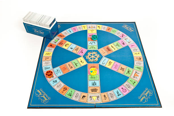 Trivial Pursuit Game Board with Card Box and  Player Pieces stock photo