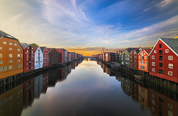 Trondheim at Sunset Old storehouses in Trondheim, Norway.  norway stock pictures, royalty-free photos & images