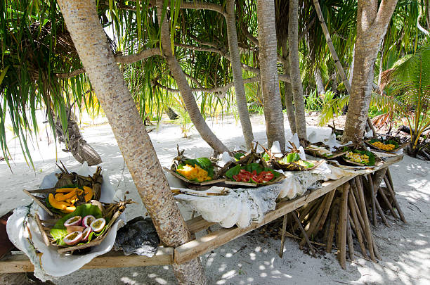 tropical food served outdoor in aitutaki lagoon cook islands - cook islands stok fotoğraflar ve resimler