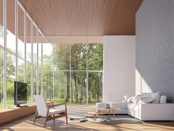 Tropical house living room 3d render Tropical house living room 3d render.The Rooms have wooden floors and ceiling,concrete tile wall.furnished with white fabric furniture.There are large window. Overlooks to garden view. tall high stock pictures, royalty-free photos & images