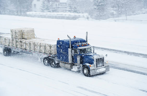 Truck and blizzard stock photo