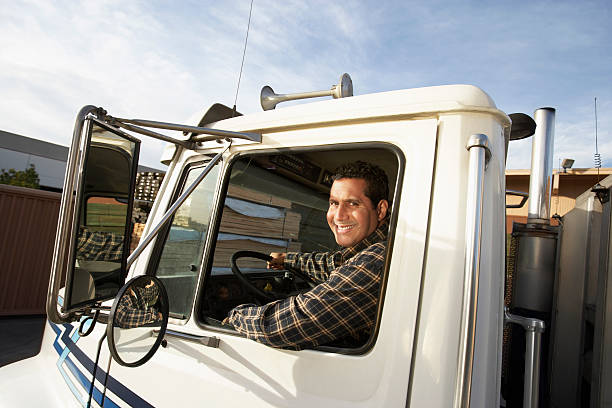Truck Driver Behind the Wheel stock photo
