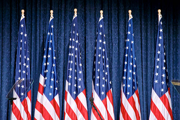 Trump announces security policy in Philadelphia, Pennsylvania Philadelphia, PA, USA - September 7, 2016: American flags for the decor on stage at a Donald Trump campaign event in Philadelphia, PA. donald trump stock pictures, royalty-free photos & images
