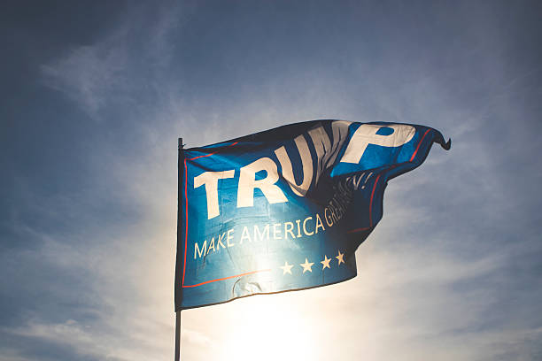 Trump Las Vegas, USA - November 6, 2016: An editorial stock photo of a Trump flag. Photographed during just before sunset in Las Vegas, Nevada. Photographed using the Canon EOS 1DX Mark II. donald trump stock pictures, royalty-free photos & images