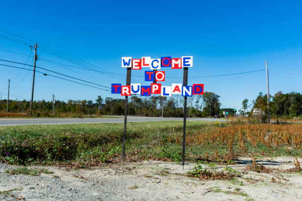 Trumpland Sign Trumpland Sign on side of road in rural North Carolina donald trump stock pictures, royalty-free photos & images