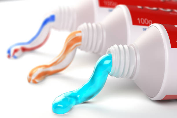 Tubes of toothpaste in different colors and different types of toothpaste stock photo