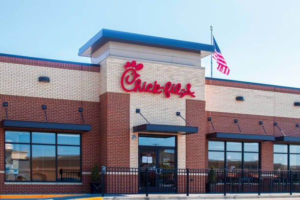 Tulsa USA _ Chick-fil-A store with American flag stock photo