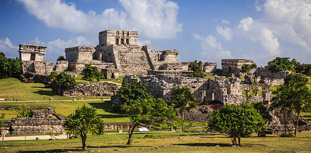 Tulum - Mayan Ruins Mayan Ruins of Tulum in Quintana Roo, Mexico. This Ancient Ruins are Located at the beach of the Caribbean Sea in the Yucatan Peninsula. mayan stock pictures, royalty-free photos & images