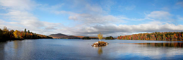 Tupper Lake In Autumn A Tiny Island In Tupper Lake, Panoramic View During Autumn In The Adirondack Mountains, New York tupper lake stock pictures, royalty-free photos & images