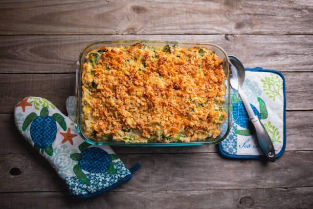 Turkey casserole with broccoli, rice and crumbled crackers Used our thanksgiving leftovers for a delicious turkey casserole! casserole stock pictures, royalty-free photos & images