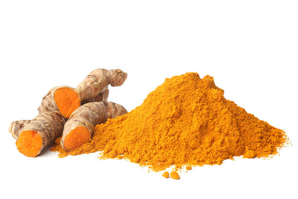 Turmeric rhizome and powder Turmeric rhizome and powder on white background turmeric stock pictures, royalty-free photos & images