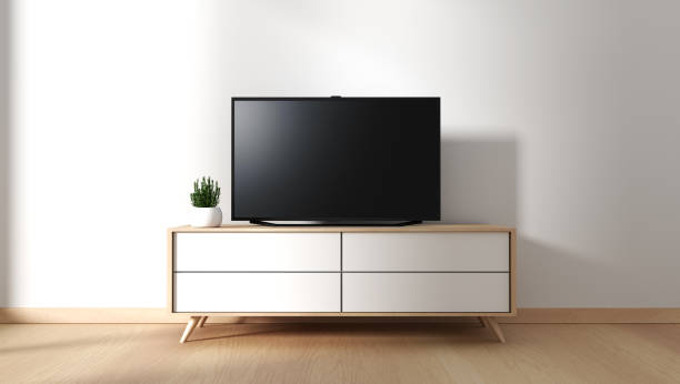 meuble tv dans salle vide moderne japonais-style zen, designs minimaux. rendu 3d - tv photos et images de collection