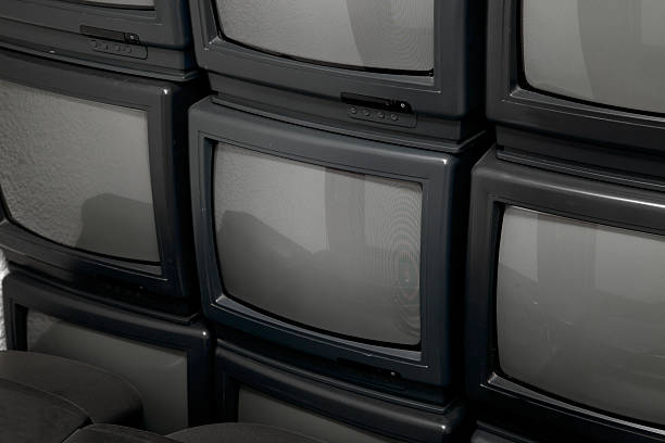 TVs A pile of old tv sets 90s television set stock pictures, royalty-free photos & images