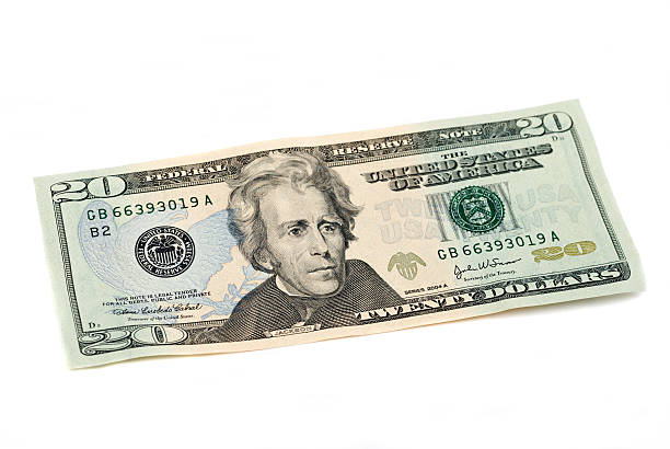 Twenty dollar bill United States currency on white Twenty dollar bill, United States Currency, on white. Studio shot. andrew jackson stock pictures, royalty-free photos & images