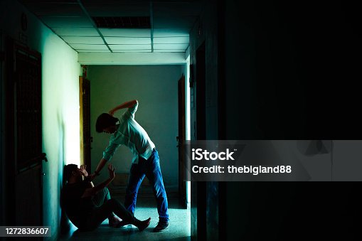 istock Two angry men facing each others. man versus man ready to fight each other, having argument. 1272836607
