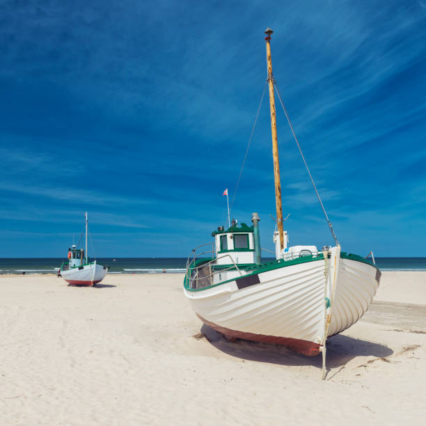 two danish fishing boats on the beach - badstrand sommar sverige bildbanksfoton och bilder