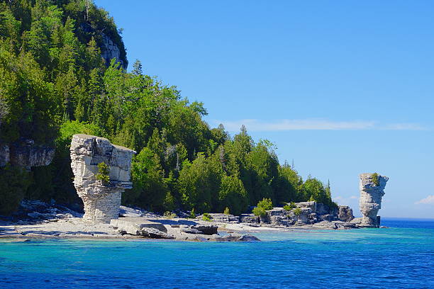 Two Flowerpots Both flowerpots on Flowerpot Island  bruce peninsula national park stock pictures, royalty-free photos & images